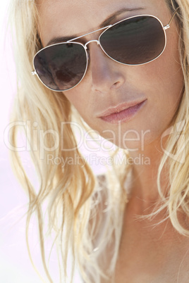 Backlit Photograph of Sexy Blond Girl In Aviator Sunglasses