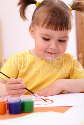 Child play with paints in preschool