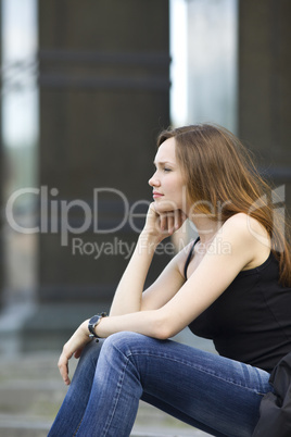 Woman sit on stair look forward