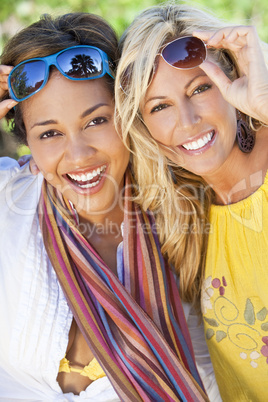 Two Beautiful Young Women Friends Laughing On Vacation