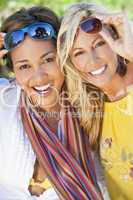 Two Beautiful Young Women Friends Laughing On Vacation