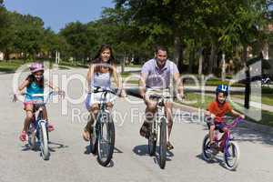 Modern Family Parents and Children Cycling