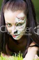 Woman with tigress face art portrait