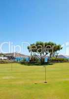 Golf field and tree at luxury hotel, Crete, Greece
