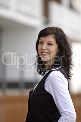 Beautiful Business woman in front of a office building