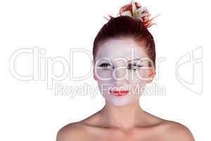 Beautiful young Geisha on a white background