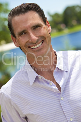 Outdoor Portrait of Handsome Smiling Middle Aged Man