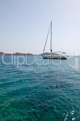 Recreation yacht and turquoise sea, Crete, Greece