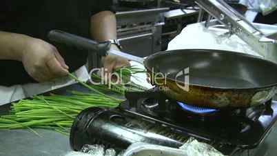 Commercial Kitchen Restaurant Cutting Onions