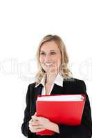 A confident businesswoman holding a red file
