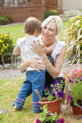 Smiling mother looking at her child