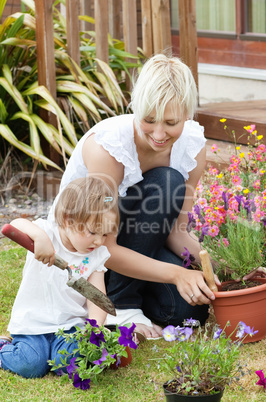 Delighted mother with her daughter outside