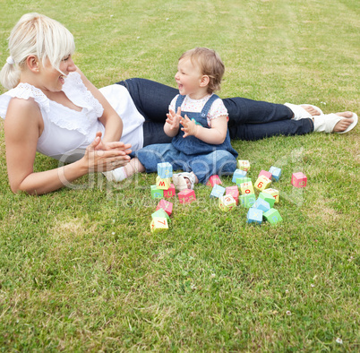 Laughing mother and child