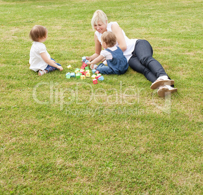 Smiling mother having fun with her kids