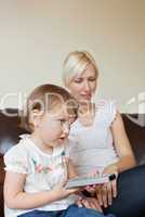 Little girl holding a remote control