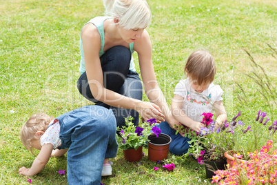 Family in the garden with flowers