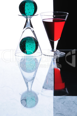 Wineglasses with green sheres