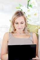 Concentrated woman with a laptop