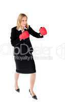 Self-assured businesswoman with boxing gloves