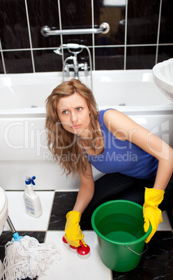 Angry woman in a bathroom