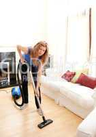 Unhappy woman with vaccum cleaner