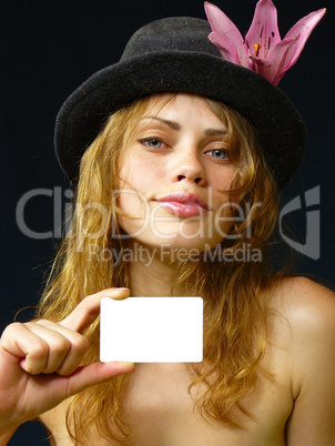 girl with a business card in a hand