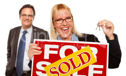 Man with Blonde Woman Holding Keys and Sold For Sale Sign