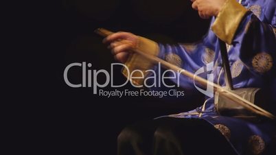Chinese man playing