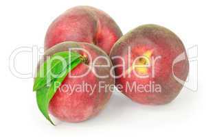 Three peaches isolated on white