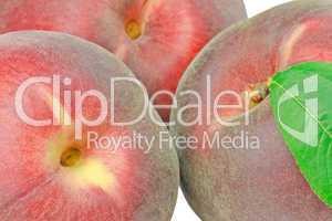 Three peaches isolated on white