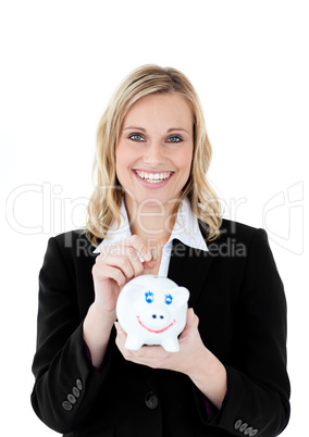 Charming businesswoman saving money in a piggy-bank