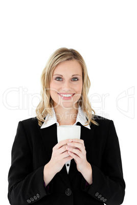 Attractive businesswoman holding a drinking cup