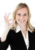 Confident young  businesswoman showing OK sign