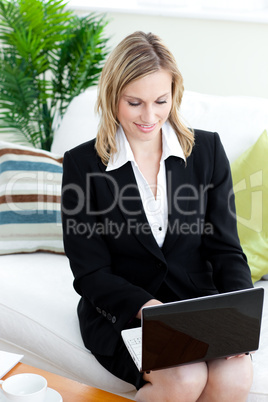 Beautiful businesswoman working at a laptop
