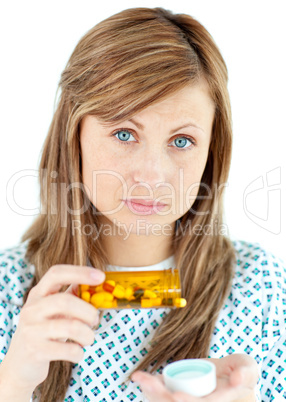Diseased woman taking pills