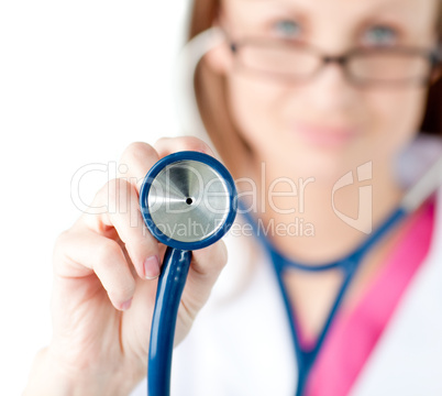 Close-up of a female doctor showing a stethoscope