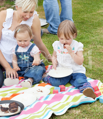 Smiling family having a picnic together