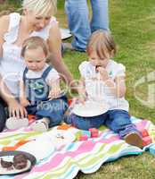 Smiling family having a picnic together