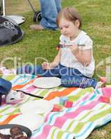 Little girl having a picnic