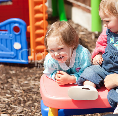 Two little girls having fun together