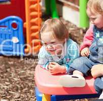 Two little girls having fun together