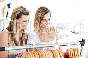 Two radiant women doing shopping