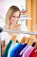Blond woman is doing shopping