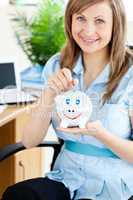 Delighted woman sitting in office on a chair