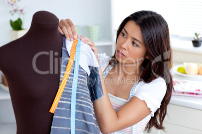 Concentrated young woman working in a store