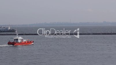Rescue boat in the bay of port (Full HD)