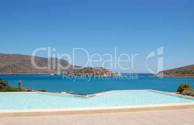 Swimming pool by luxury villa with a view on Spinalonga Island,