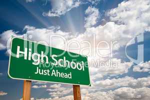 High School Green Road Sign Over Clouds