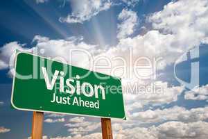 Vision Green Road Sign Over Clouds