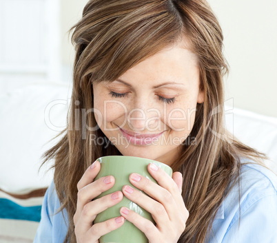 Relaxed woman enjoy her coffee